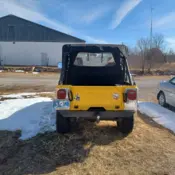 1976 Yellow Jeep CJ thumbnail