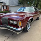 1976 Burgundy Pontiac Grand Prix thumbnail