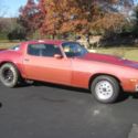 1977 red Chevrolet Camaro thumbnail