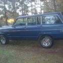 1977 Blue Jeep Wagoneer thumbnail