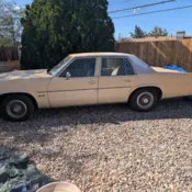 1977 Yellow Oldsmobile Ninety-Eight thumbnail