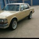 1977 Yellow Cadillac Seville thumbnail