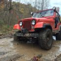 1978 Orange Jeep CJ thumbnail