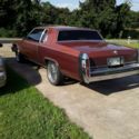 1982 Burgundy Cadillac DeVille thumbnail
