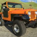 1983 Orange Jeep CJ thumbnail