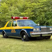 1983 Blue/Gold Plymouth Gran Fury thumbnail