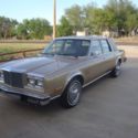 1984 Tan Chrysler New Yorker thumbnail