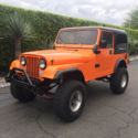1984 Orange Jeep CJ thumbnail