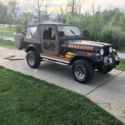 1984 Brown Jeep CJ thumbnail