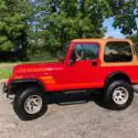1984 Red Jeep CJ thumbnail