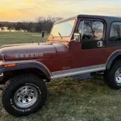 1984 Red Jeep CJ thumbnail
