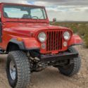 1984 Red Jeep CJ thumbnail