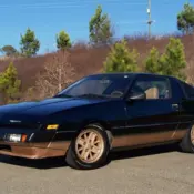 1984 Black - Gold Plymouth Conquest thumbnail