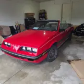 1984 Red Pontiac J2000 Sunbird thumbnail