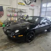 1984 Black Porsche 928 thumbnail