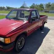 1984 Red Toyota Pickup thumbnail