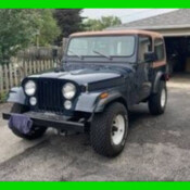 1985 Blue Jeep CJ thumbnail