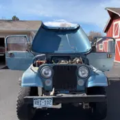 1985 Blue Jeep CJ thumbnail