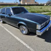 1985 Blue Oldsmobile Cutlass thumbnail