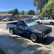 1985 Blue Toyota Pickup thumbnail