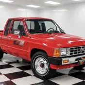 1985 Red Toyota Pickup thumbnail