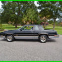 1986 Black Oldsmobile Cutlass thumbnail