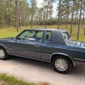 1986 Blue Dodge Aries thumbnail