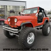 1986 Orange Jeep CJ-7 thumbnail