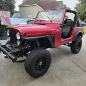 1986 Red Jeep CJ thumbnail