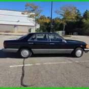 1986 Black Mercedes-Benz 400-Series thumbnail