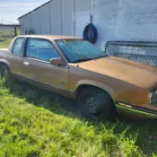 1986 Gold Oldsmobile Calais thumbnail