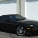 1986 Black Porsche 928 thumbnail