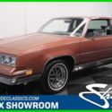 1986 Red Oldsmobile Cutlass thumbnail