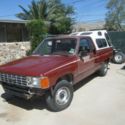 1986 Burgundy Toyota Pickup thumbnail