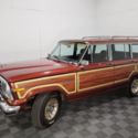 1987 Burgundy Jeep Wagoneer thumbnail
