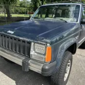 1987 Blue Jeep Cherokee thumbnail