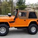 1987 Orange Jeep Wrangler thumbnail