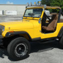 1987 Yellow Jeep Wrangler thumbnail