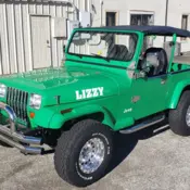 1987 Green Jeep Wrangler thumbnail