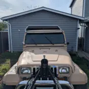 1988 Tan Jeep Wrangler thumbnail