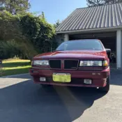 1987 Red Pontiac Grand Am thumbnail
