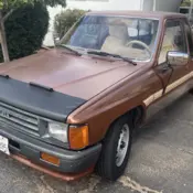 1987 Brown Toyota Pickup thumbnail