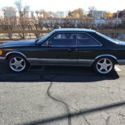 1987 Gold Mercedes-Benz 500-Series thumbnail
