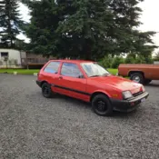 1988 Red Chevrolet Geo Sprint thumbnail