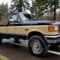 1988 Blue and tan Ford F-250 thumbnail