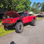 1988 Red Jeep Comanche thumbnail