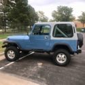 1988 Blue Jeep Wrangler thumbnail