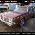 1988 Burgundy Oldsmobile Custom Cruiser thumbnail