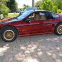 1988 Burgundy Pontiac Fiero thumbnail