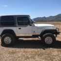 1989 White Jeep Wrangler thumbnail
